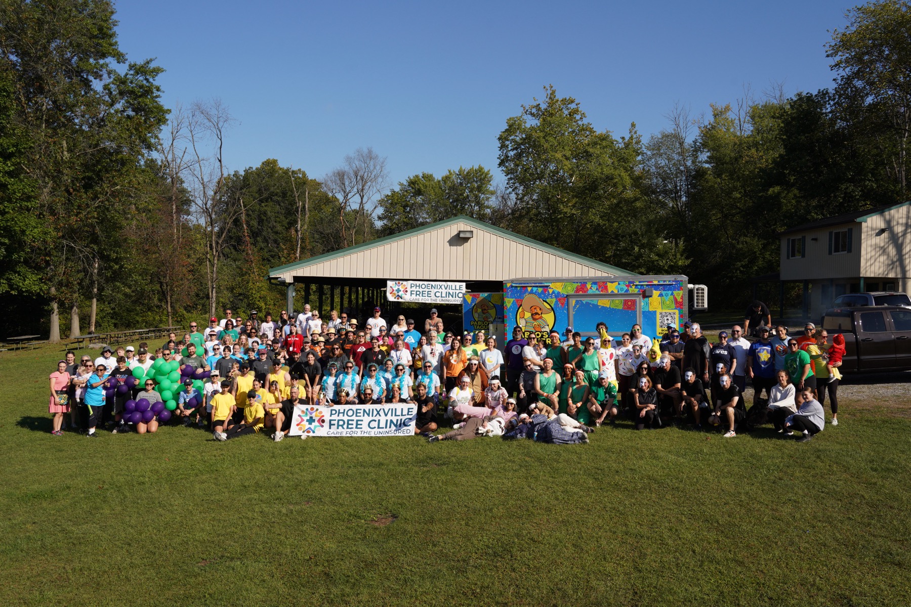 The whole 2025 Field Day crowd behind the Phoenixville Free Clinic banner